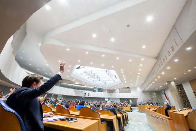 MPs are voting in the Plenary Hall of the House or Representatives